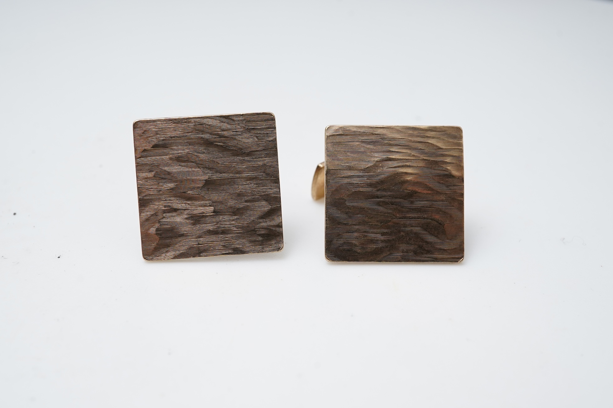 Two pairs of gold cufflinks